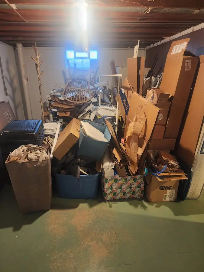 Roll-off dumpster container at job site for 6 Yard Dumpster Rental in Oneida